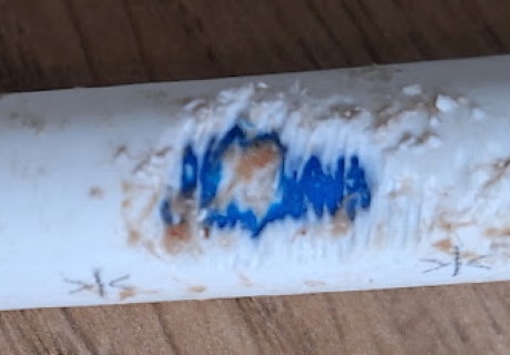 This hot water pipe was leaking behind a customers dishwasher...